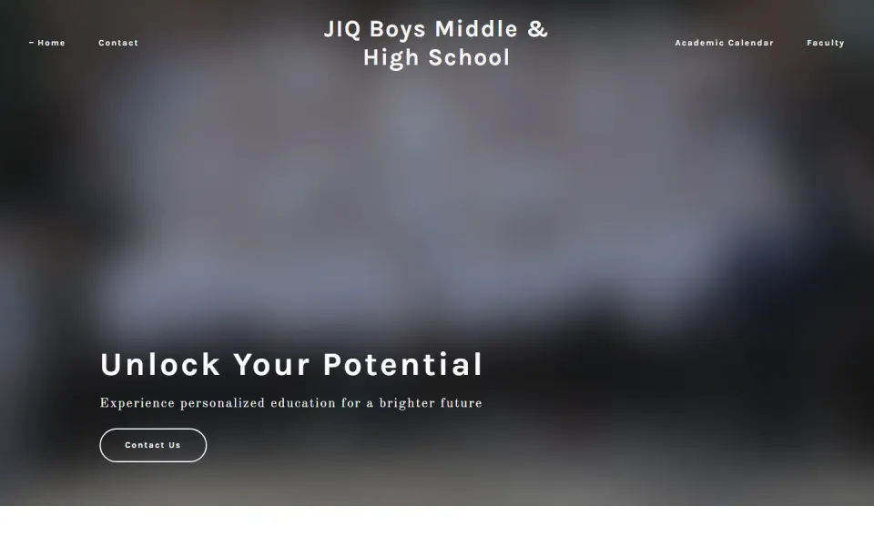 The school home page on a laptop, with a group photo, navigation and a contact button.