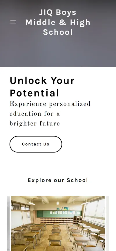 The school home page on a phone, with a menu button, headline and contact button.